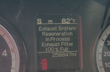 DPF warning light on diesel truck dashboard