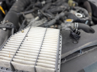 Engine air filter inspection and replacement service