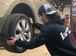 Suspension inspection of shocks and struts on a vehicle lift