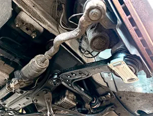 Suspension components under vehicle during inspection